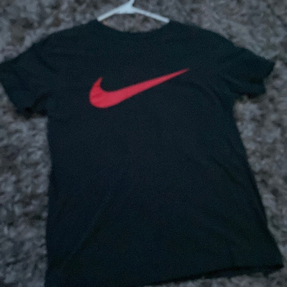 Small black Nike shirt